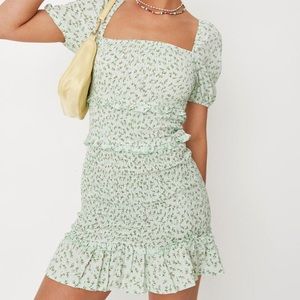 Green floral body con shirred dress